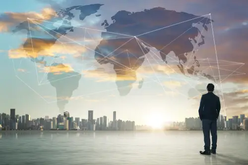 international-business-concept-with-businessman-on-city-skyline-background-with-networ-SBI-301985848 Business